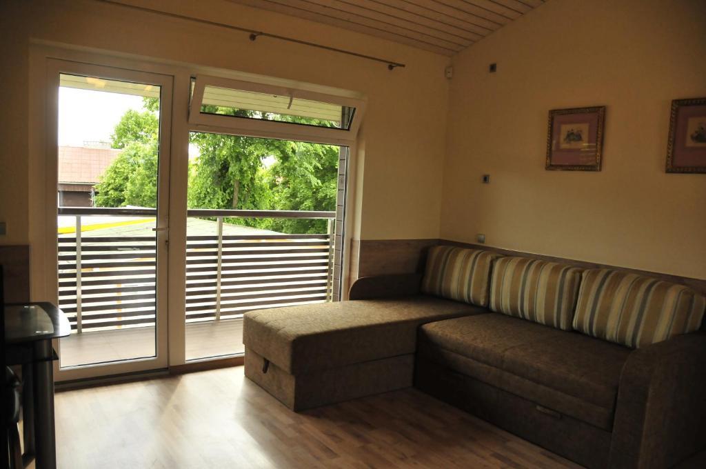 Apartamentai Trys Pusys Šventoji Rum bild